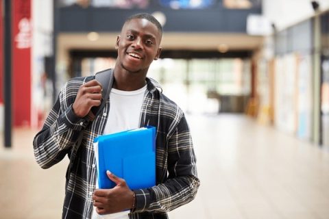 portrait-male-student-standing-c