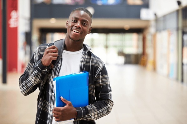 portrait-male-student-standing-c